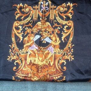 Angel crested scarf with cheetah print and finial corners featuring puti angels